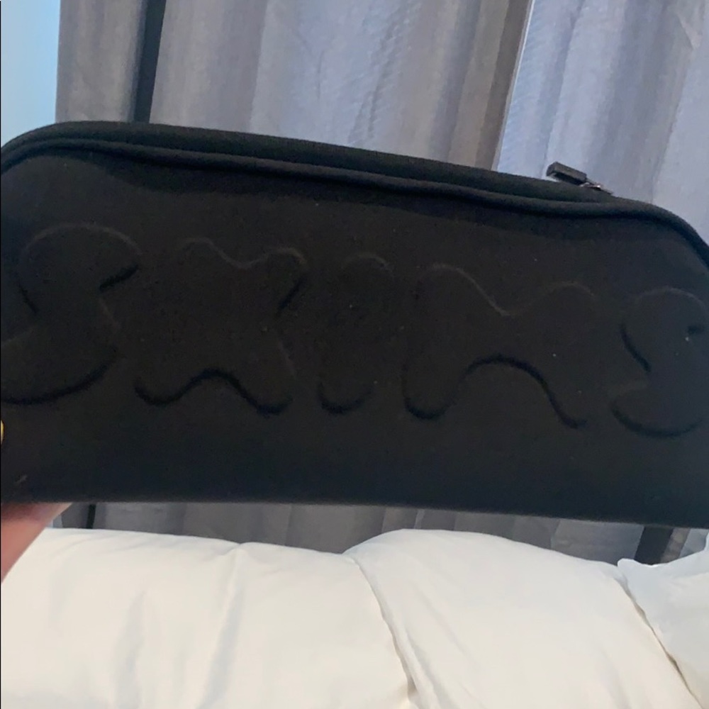 SKIMS Black neoprene pouch